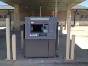 Picture of an ATM installed in a bank drive thru in Frisco TX